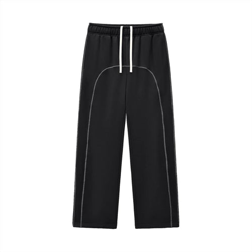 Black streetwear jogger pants with white drawstring and curved stitching, modern urban style